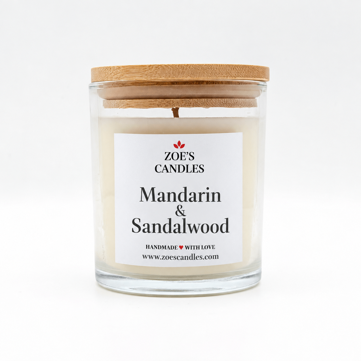 Mandarin Sandalwood scented candle in a clear glass jar with a bamboo lid